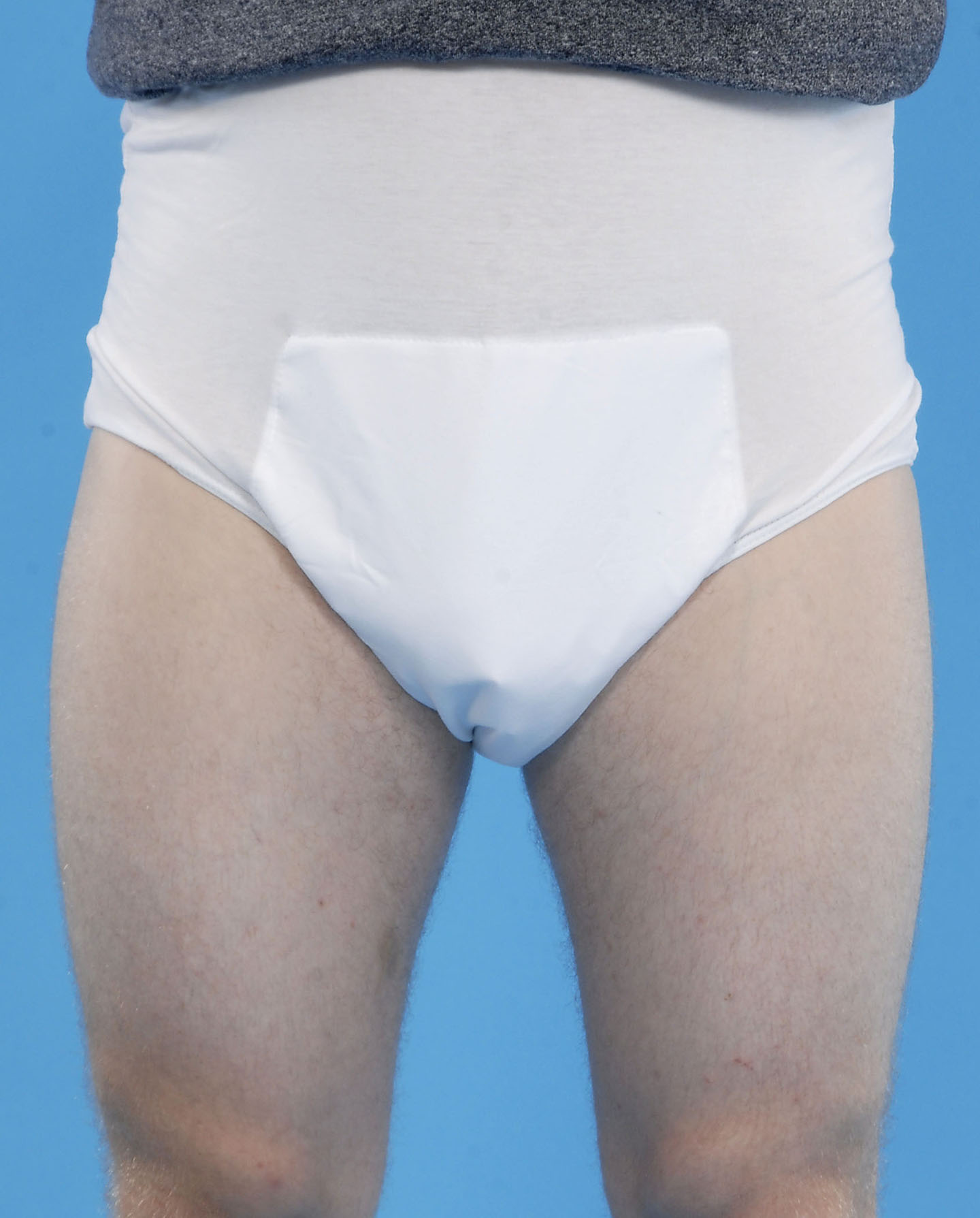 Washable pant with integral pad