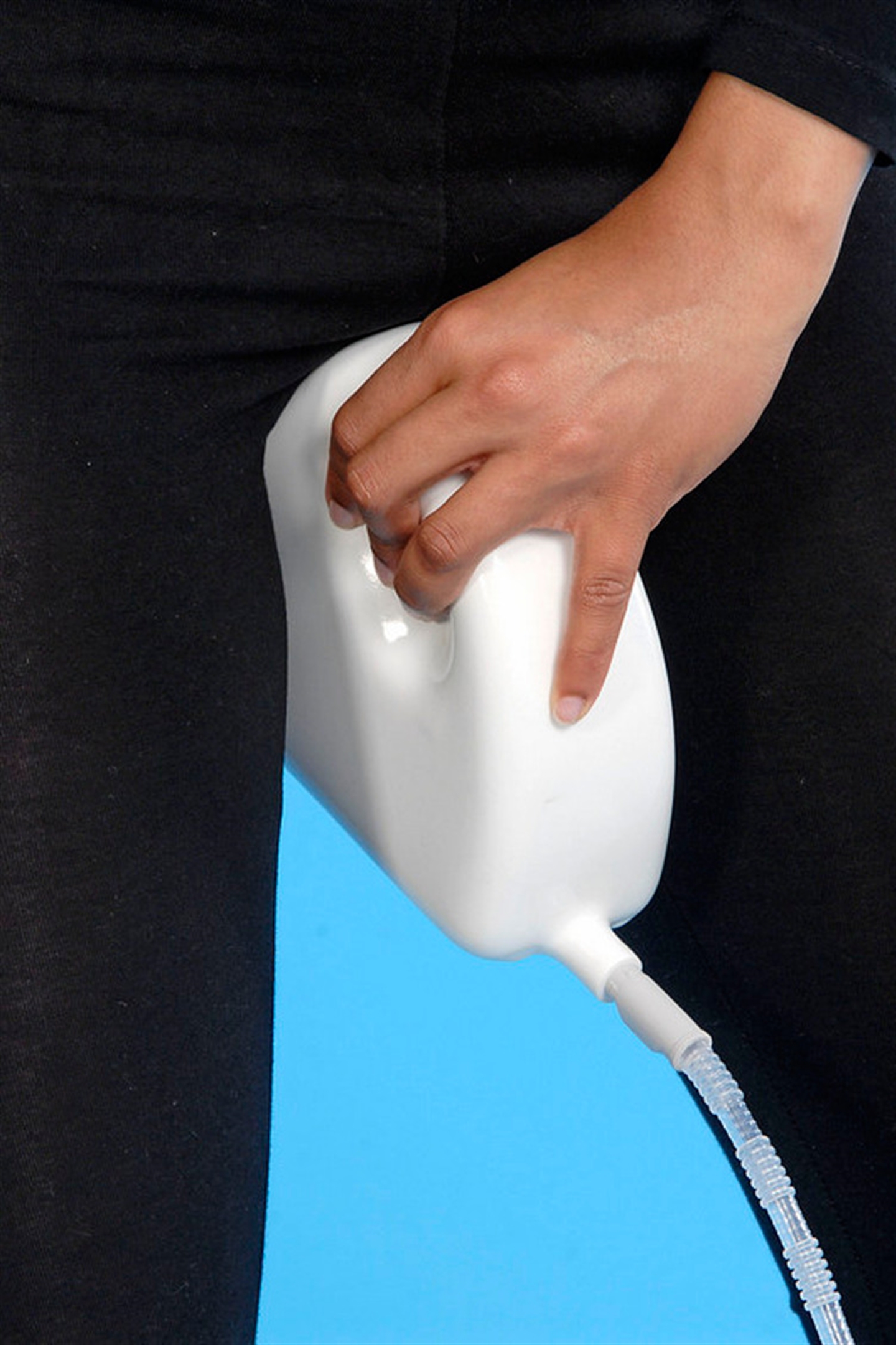 Jug urinal with hand grip and collection bag