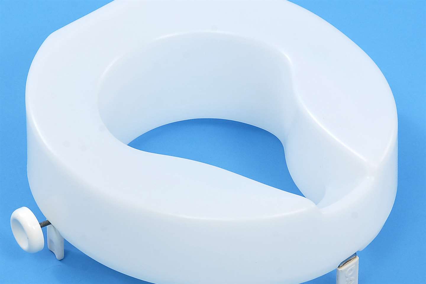 Raised toilet seat