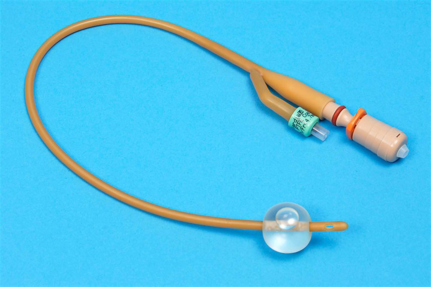 Foley indwelling catheter with a reusable catheter valve attached