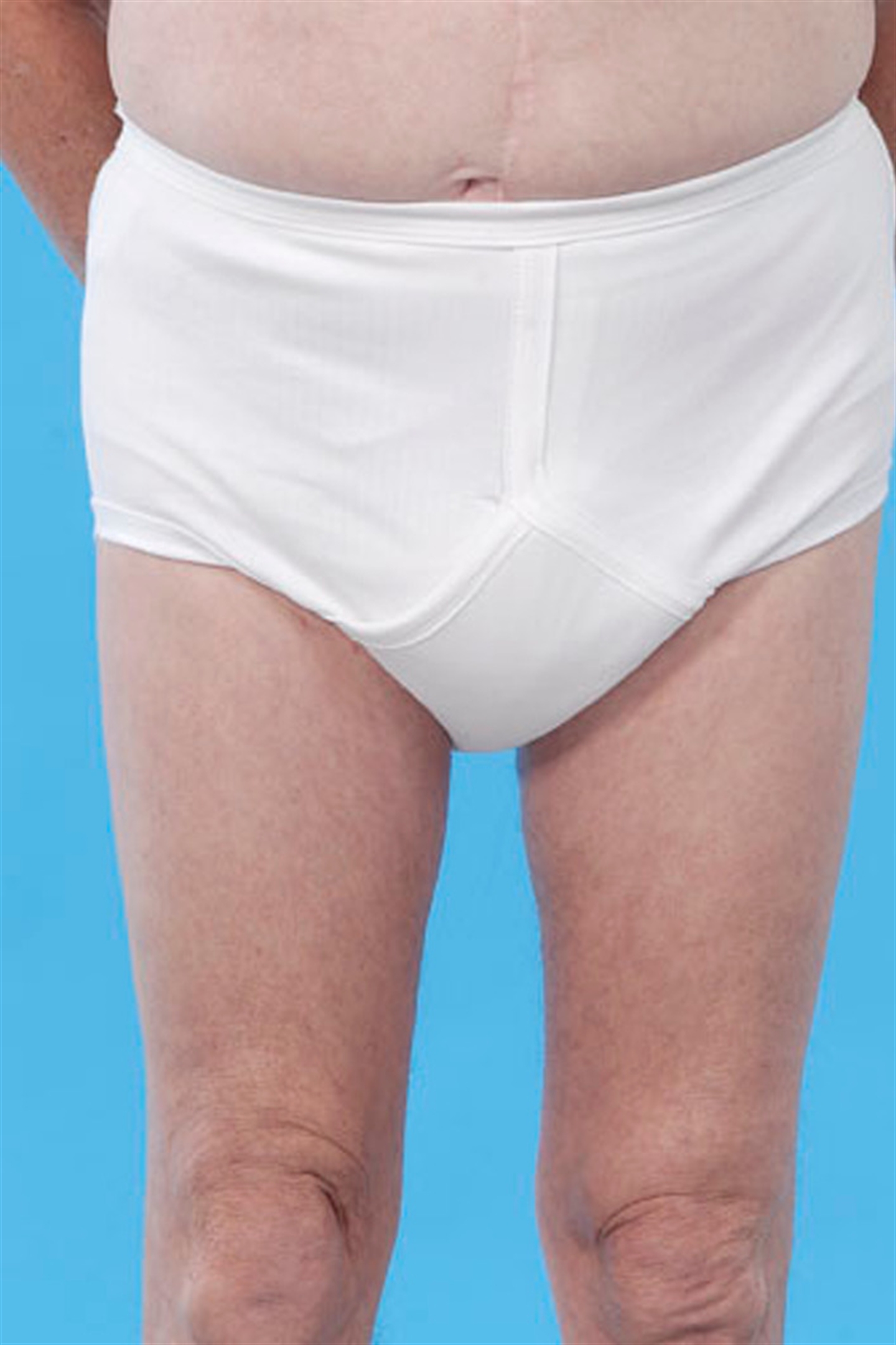 Washable pant with integral pad (pantegral) with fly opening