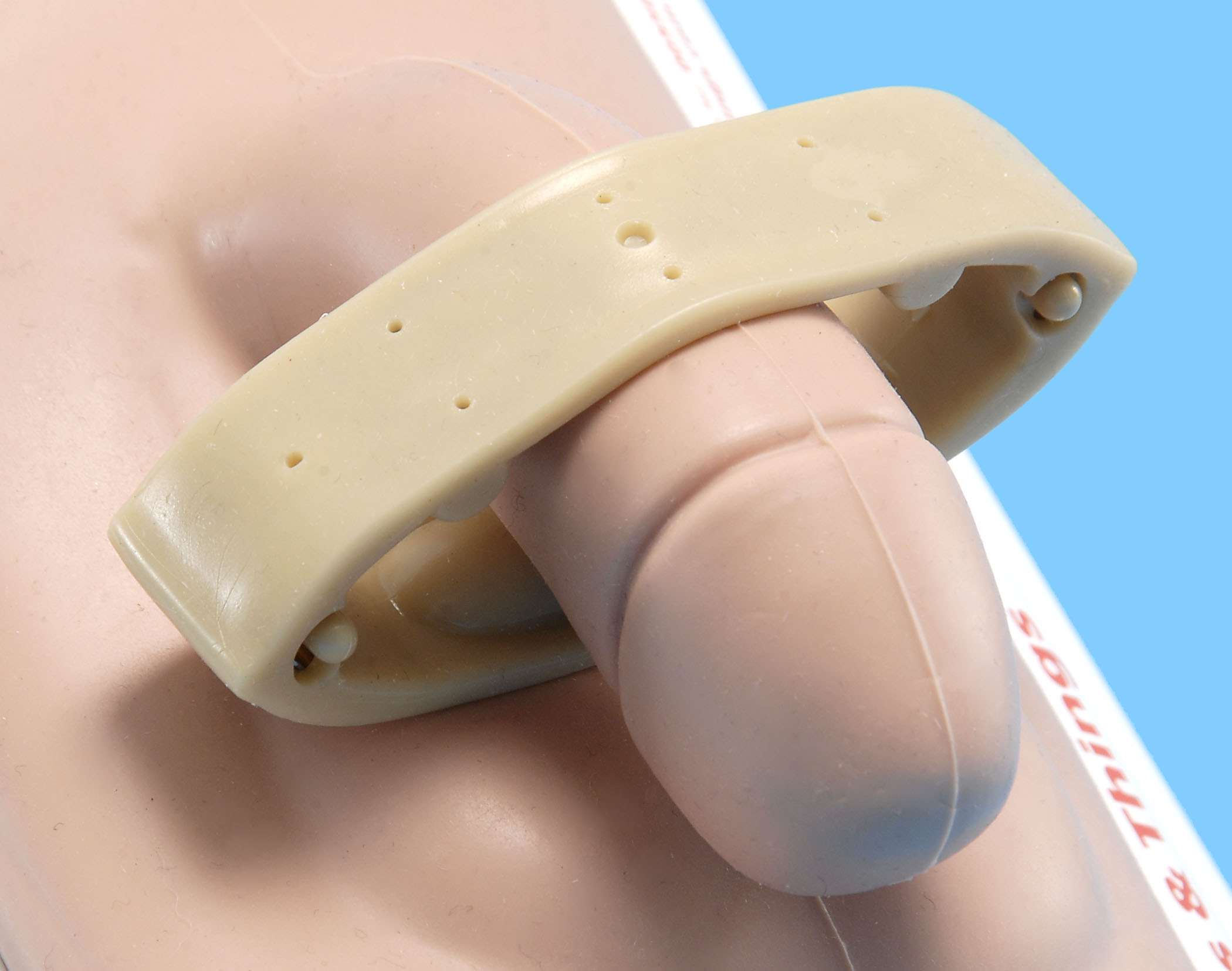 Penile compression device 
